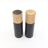 Elegant salt- og peberkværn i eg og pulverlakeret aluminium